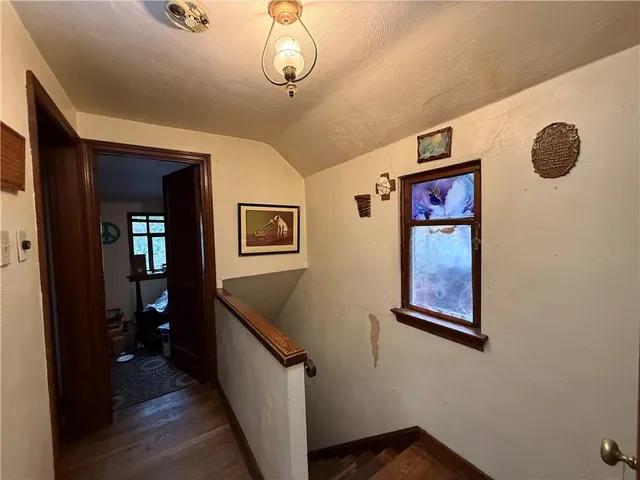 a room with a bed and a window