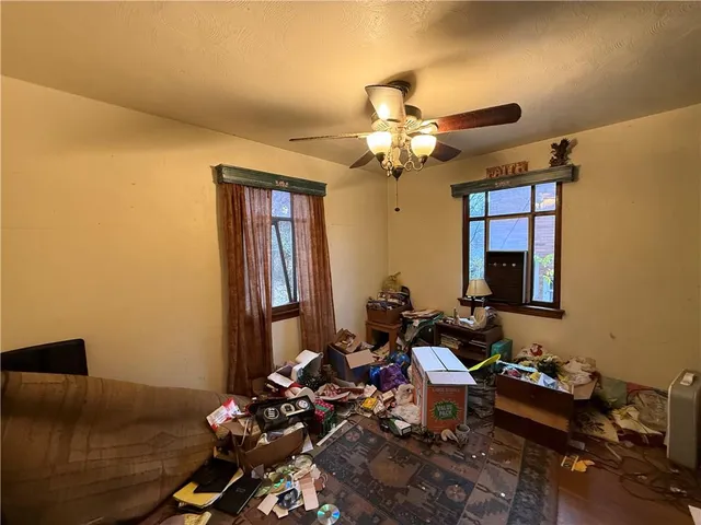 a room with gym equipment and a window
