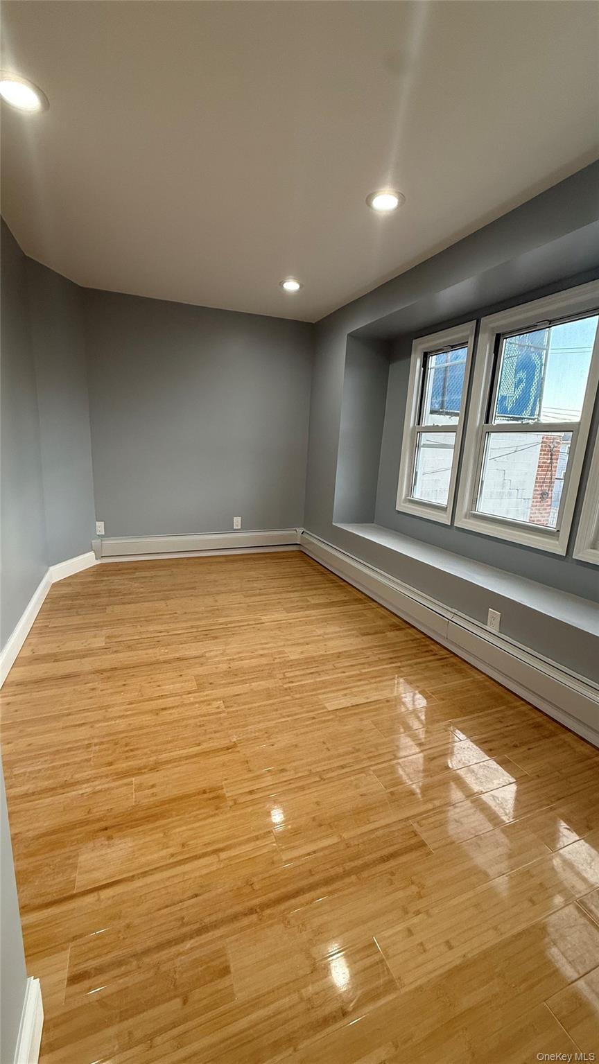 116-45 195th Street Queens, NY 11412 - Photo 14 of 21 a view of empty room with window