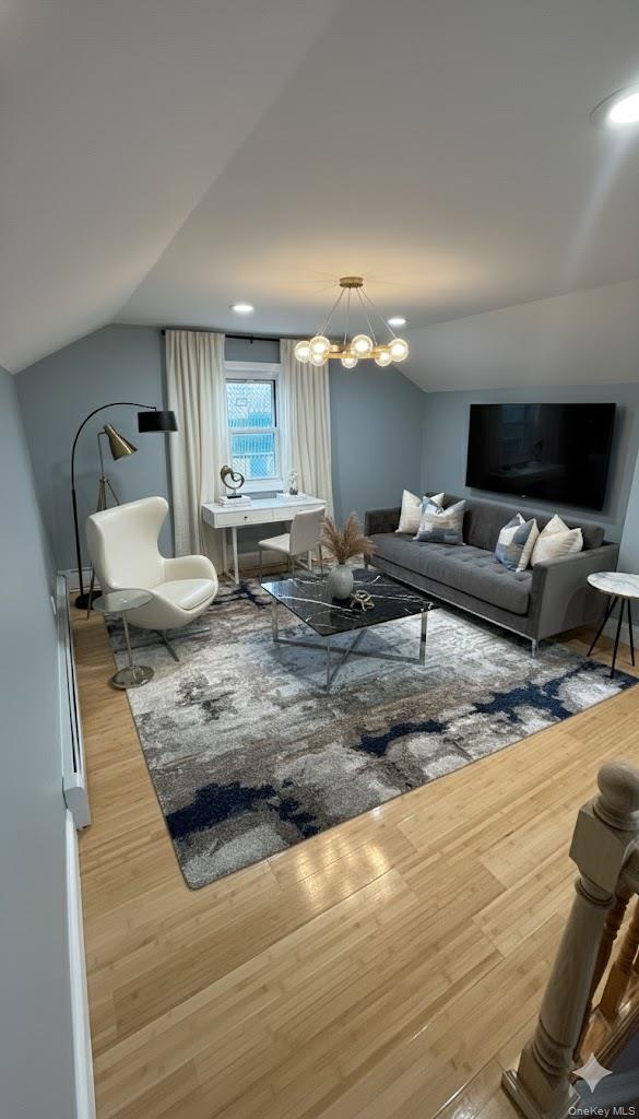 116-45 195th Street Queens, NY 11412 - Photo 18 of 21 a living room with furniture and a flat screen tv