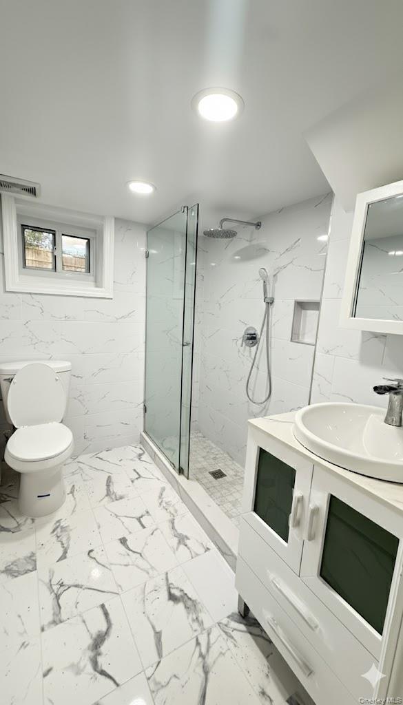 116-45 195th Street Queens, NY 11412 - Photo 21 of 21 a bathroom with a sink toilet and shower