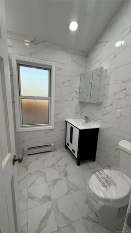 a bathroom with a sink and a vanity