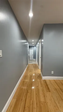 a view of hallway with a large window