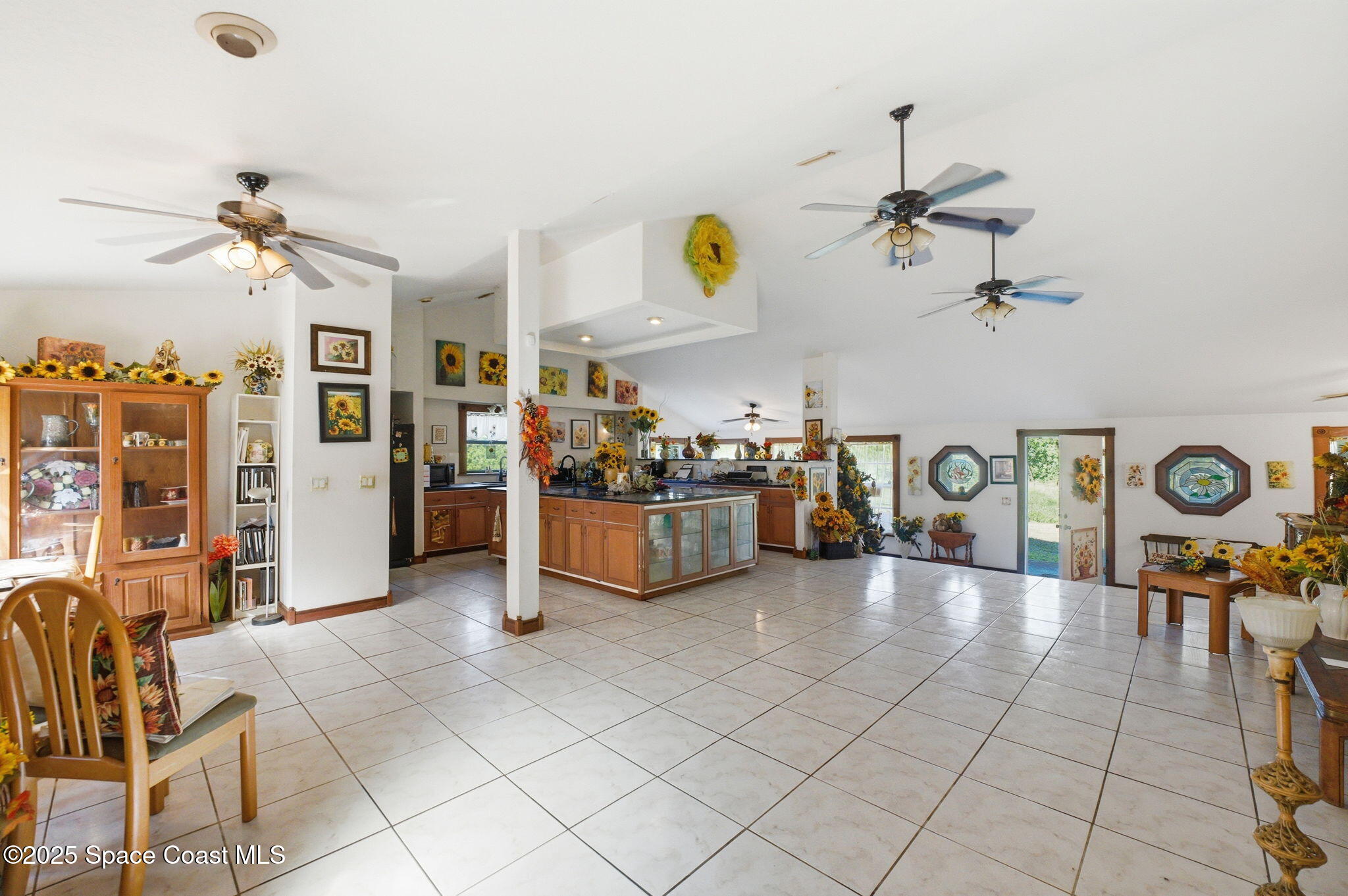 2821-2825 Lionel Road Mims, FL 32754 - Photo 12 of 42 a living room with furniture and window