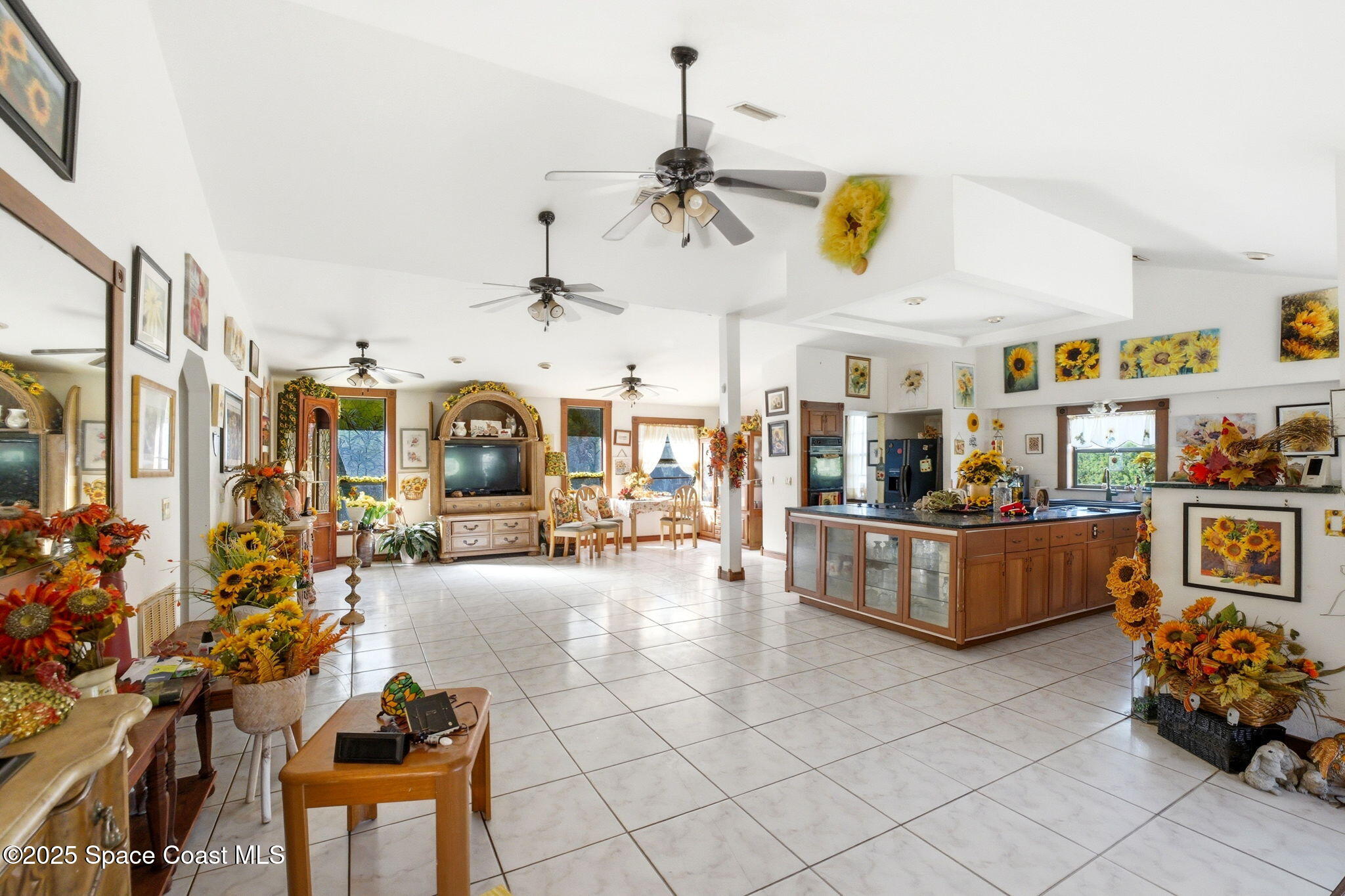 2821-2825 Lionel Road Mims, FL 32754 - Photo 13 of 42 a view of living room with kitchen and furniture