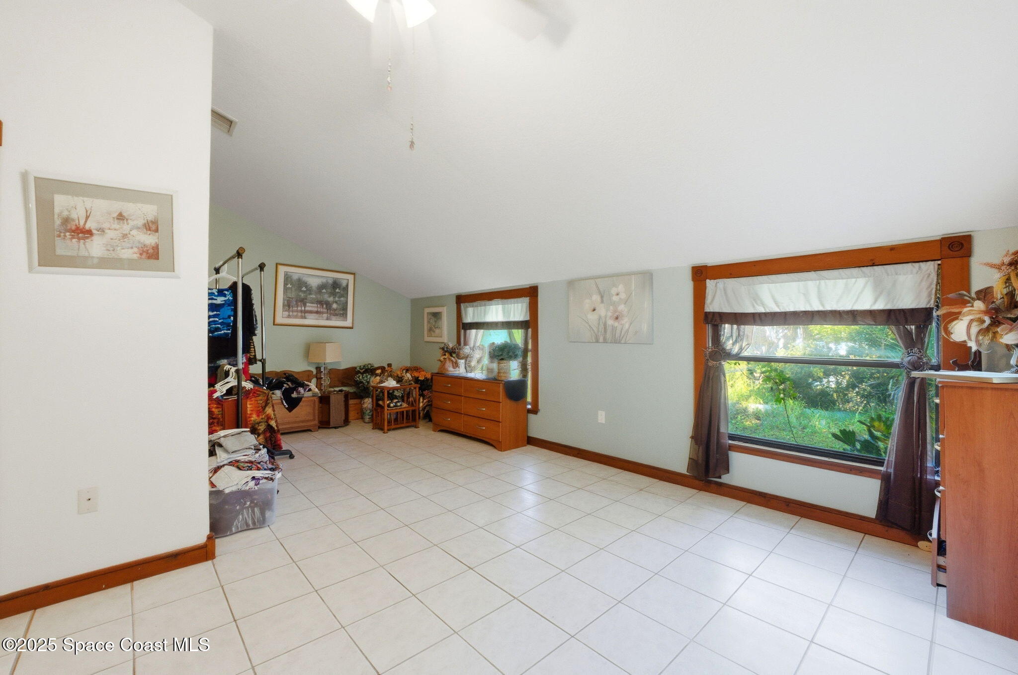 2821-2825 Lionel Road Mims, FL 32754 - Photo 18 of 42 a view of a livingroom with lounge chair and a large window