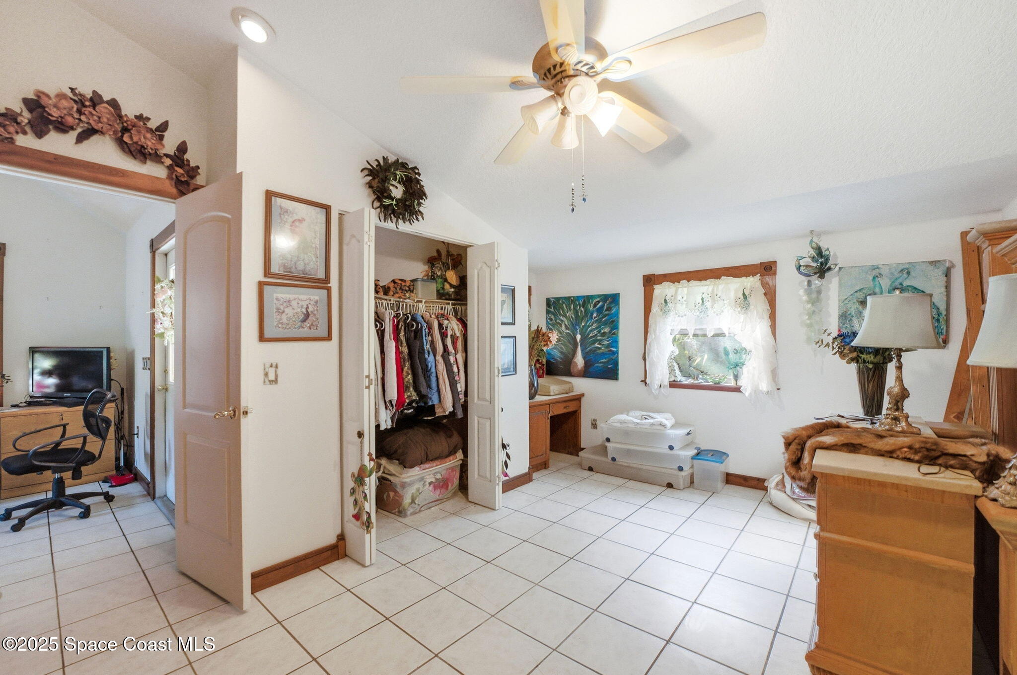 2821-2825 Lionel Road Mims, FL 32754 - Photo 24 of 42 a view of a livingroom with furniture and a window