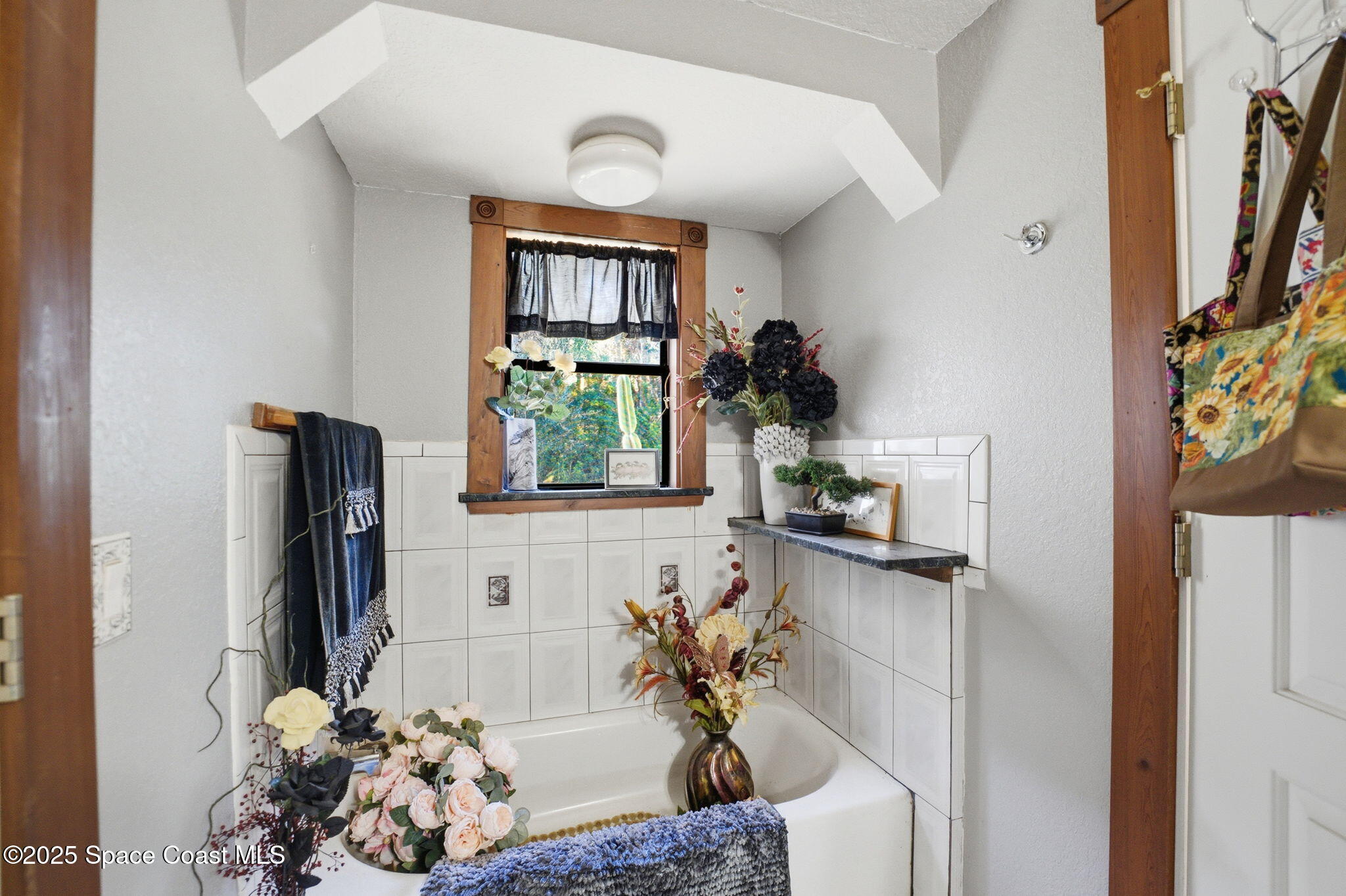 2821-2825 Lionel Road Mims, FL 32754 - Photo 27 of 42 a living room with furniture and a window