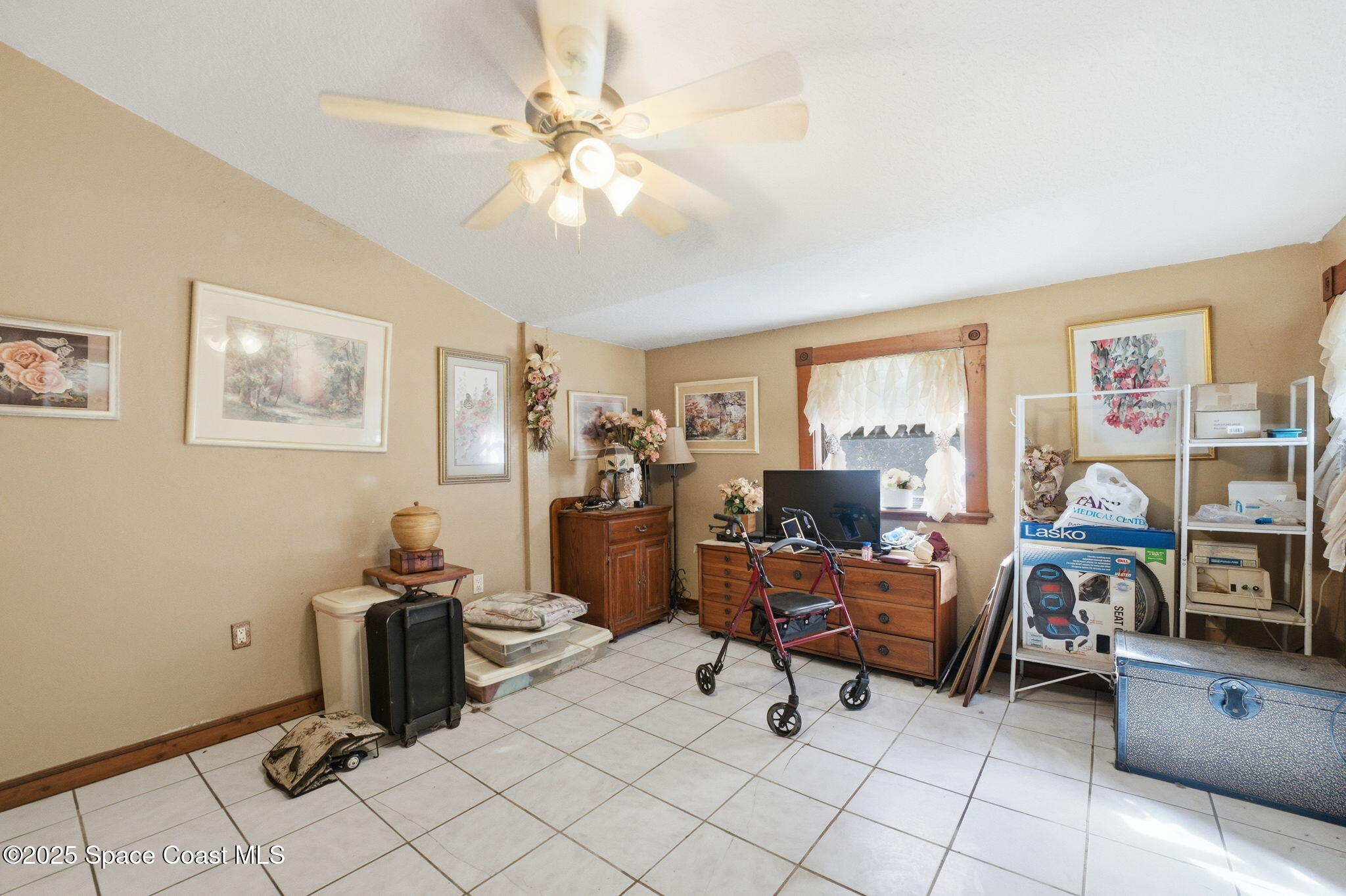 2821-2825 Lionel Road Mims, FL 32754 - Photo 28 of 42 a view of a workspace with a window