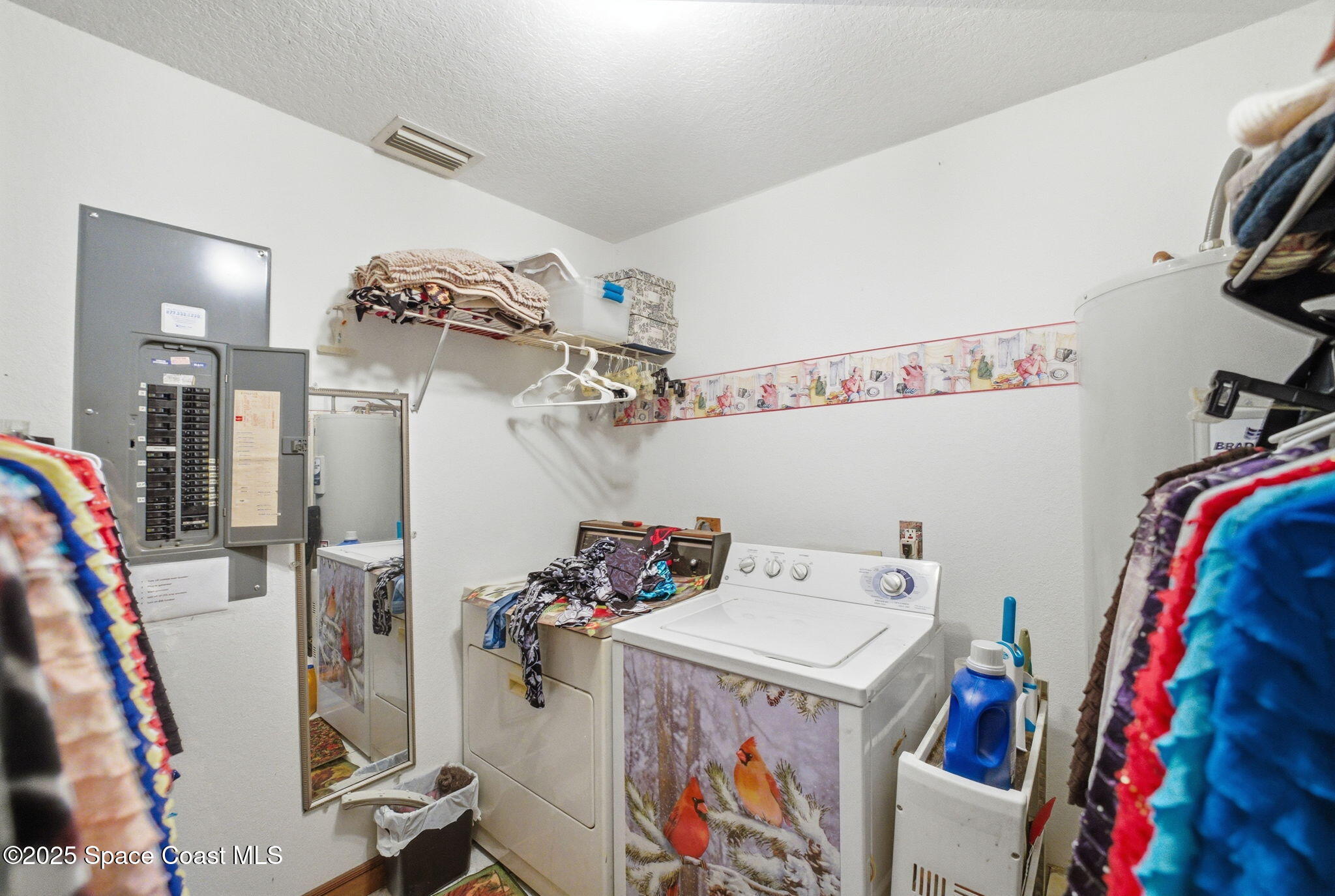 2821-2825 Lionel Road Mims, FL 32754 - Photo 30 of 42 a utility room with dryer and washer