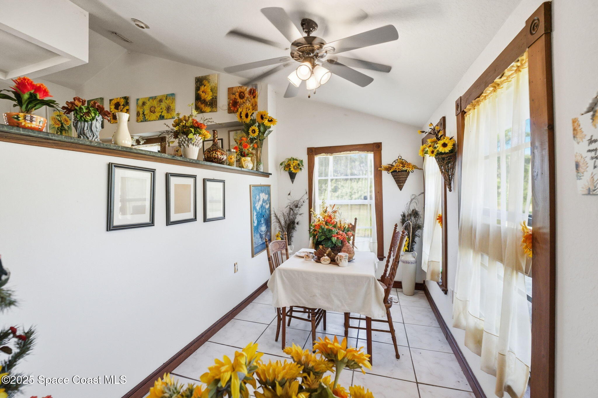 2821-2825 Lionel Road Mims, FL 32754 - Photo 10 of 42 a view of a living room and a balcony