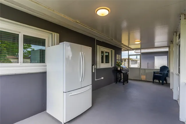 a refrigerator freezer sitting in a kitchen