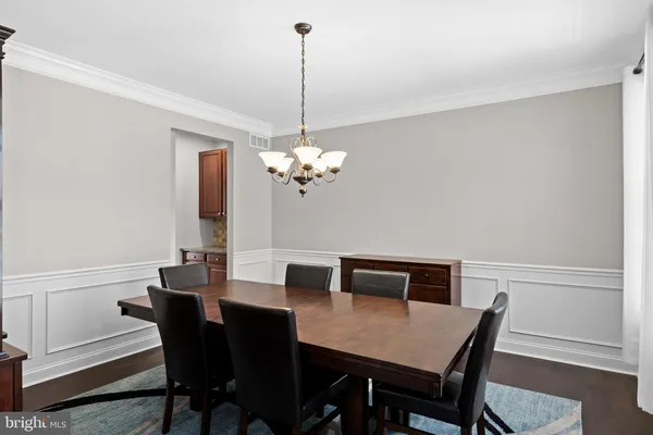 a room with furniture and wooden floor