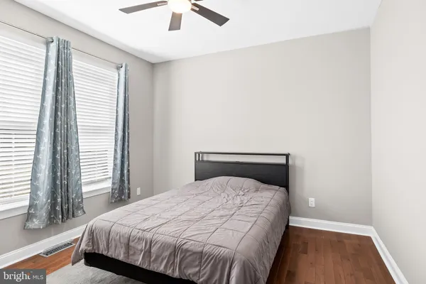 a view of front door with wooden floor