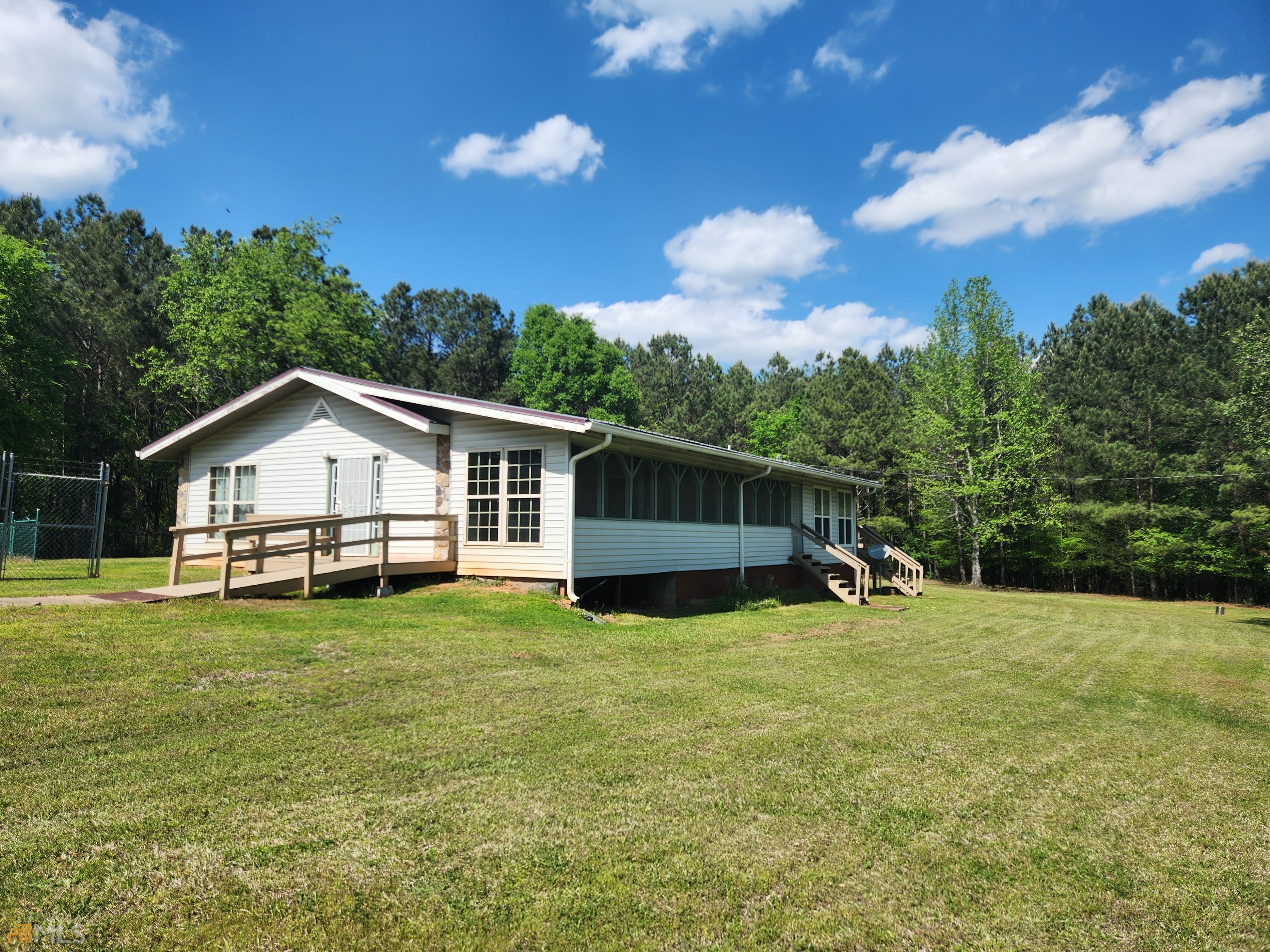 88 Ousley Road Palmetto, GA 30268 - Photo 1 of 1 a view of a house with backyard