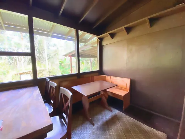 a room with furniture and a window