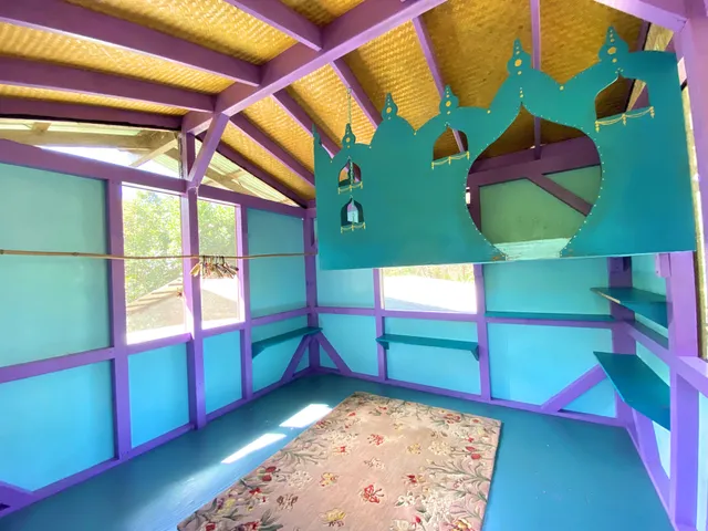 a view of an entryway with a bed