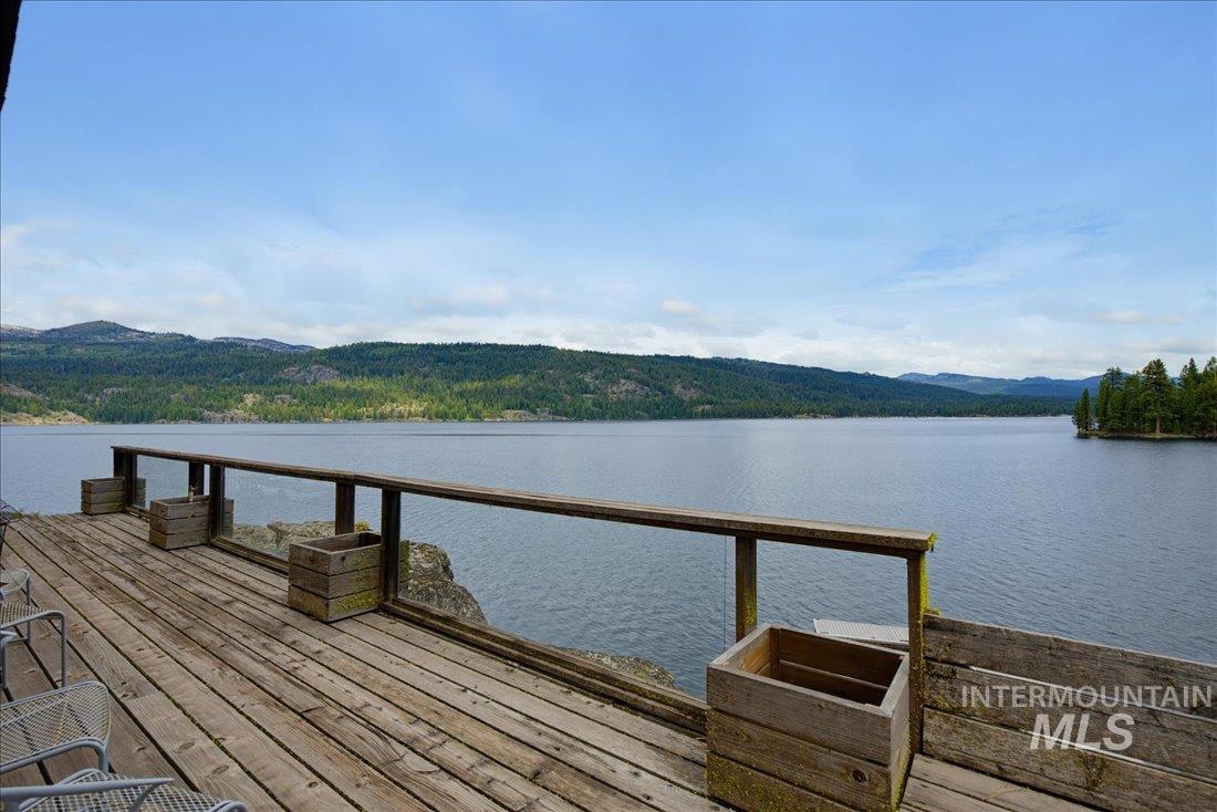 3800 Warren Wagon Road McCall, ID 83638 - Photo 34 of 50 Expansive outdoor deck with wood-plank flooring and railing