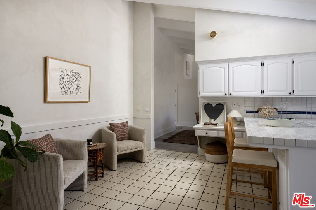 29328 Heathercliff Road Malibu, CA 90265 - Photo 15 of 41 a living room with furniture and a couch