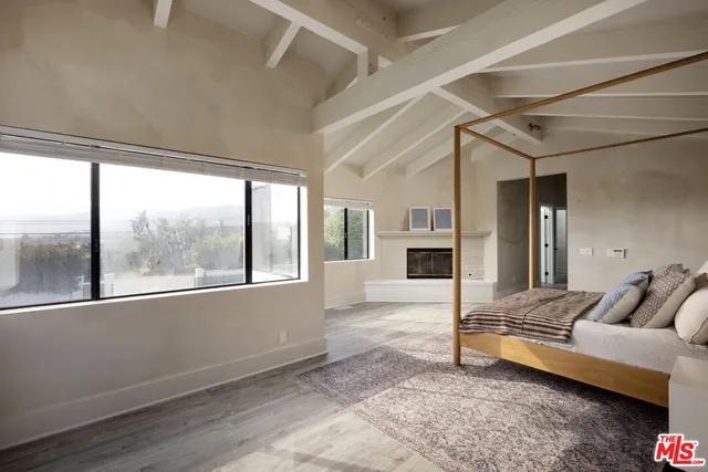 a spacious bathroom with a double vanity sink mirror and toilet