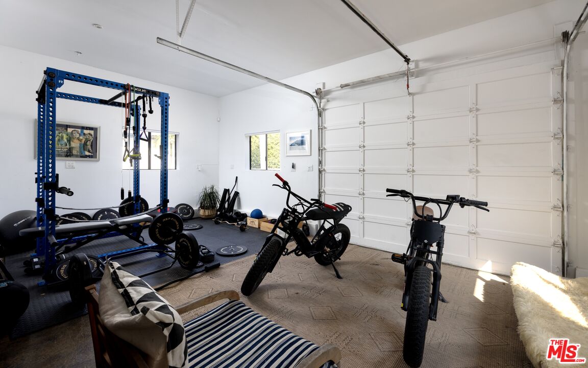 29328 Heathercliff Road Malibu, CA 90265 - Photo 30 of 41 a view of a room with gym equipment