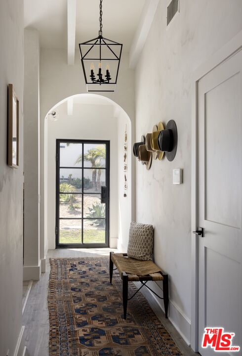 29328 Heathercliff Road Malibu, CA 90265 - Photo 4 of 41 a bedroom with a bed and a window