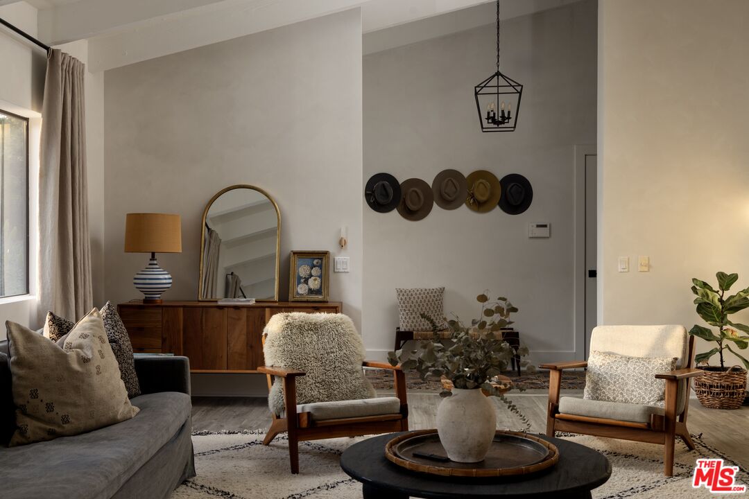29328 Heathercliff Road Malibu, CA 90265 - Photo 6 of 41 a living room with furniture flowerpot and a window