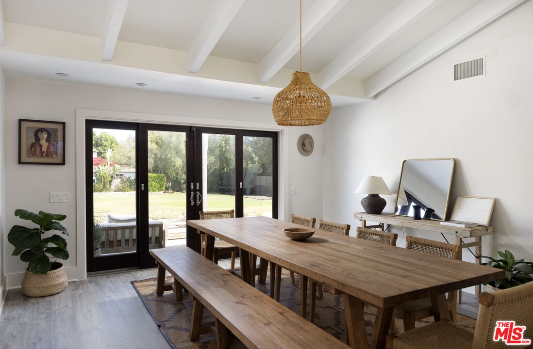 29328 Heathercliff Road Malibu, CA 90265 - Photo 9 of 41 a view of a dining room with furniture window and outside view