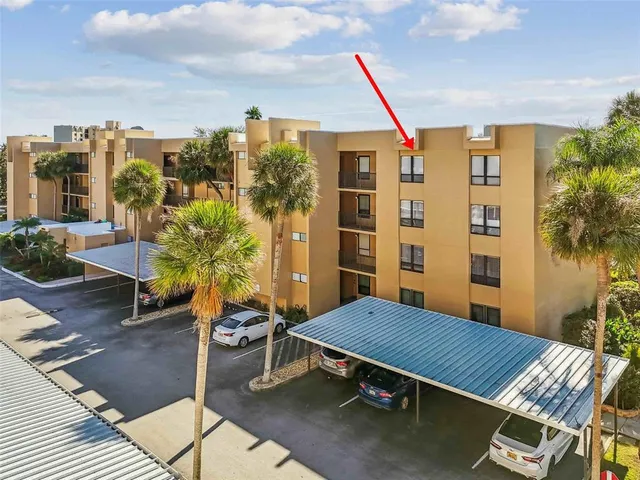 a view of a hallway with washer and dryer