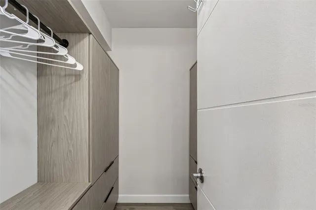 a view of a patio with a table and chairs