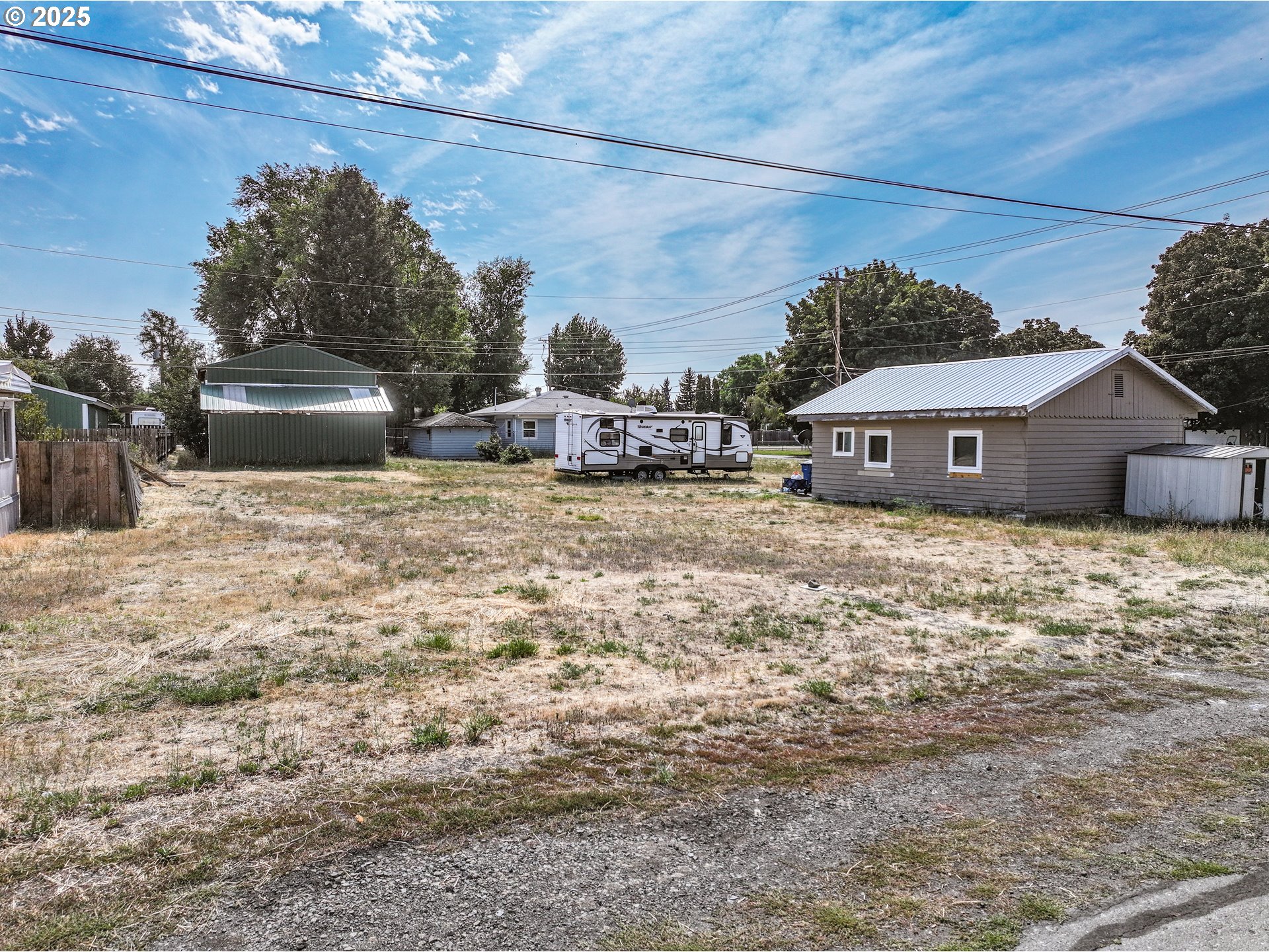 Situs Unknown Goldendale, WA 98620 - Photo 5 of 10 a garage with a car parked in front of it