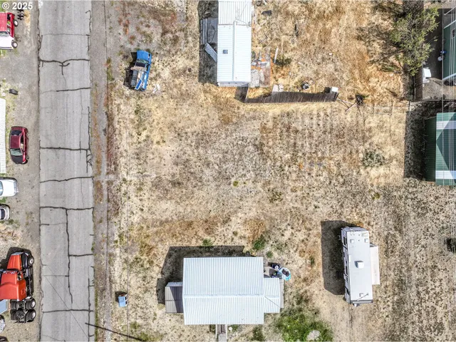 view of a brick wall next to a building