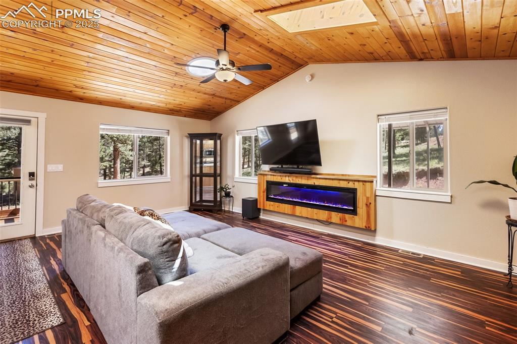 234 Wahsatch Road Florissant, CO 80816 - Photo 12 of 44 Electric 7 ft. fireplace, a focal point and wonderful gathering place for entertaining
