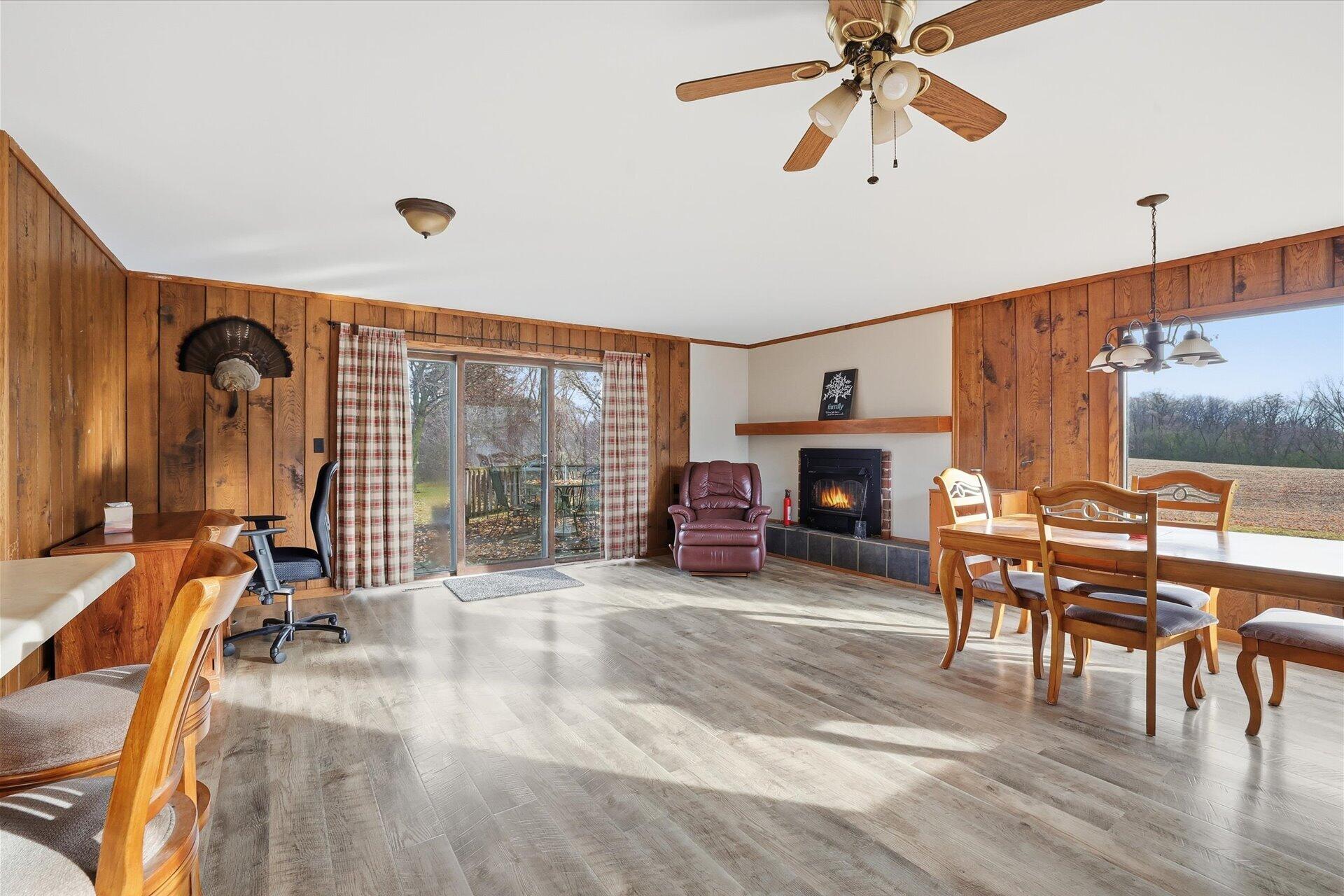 N8838 County Road East East Troy, WI 53120 - Photo 2 of 26 Fireplace, Dining and Kitchen