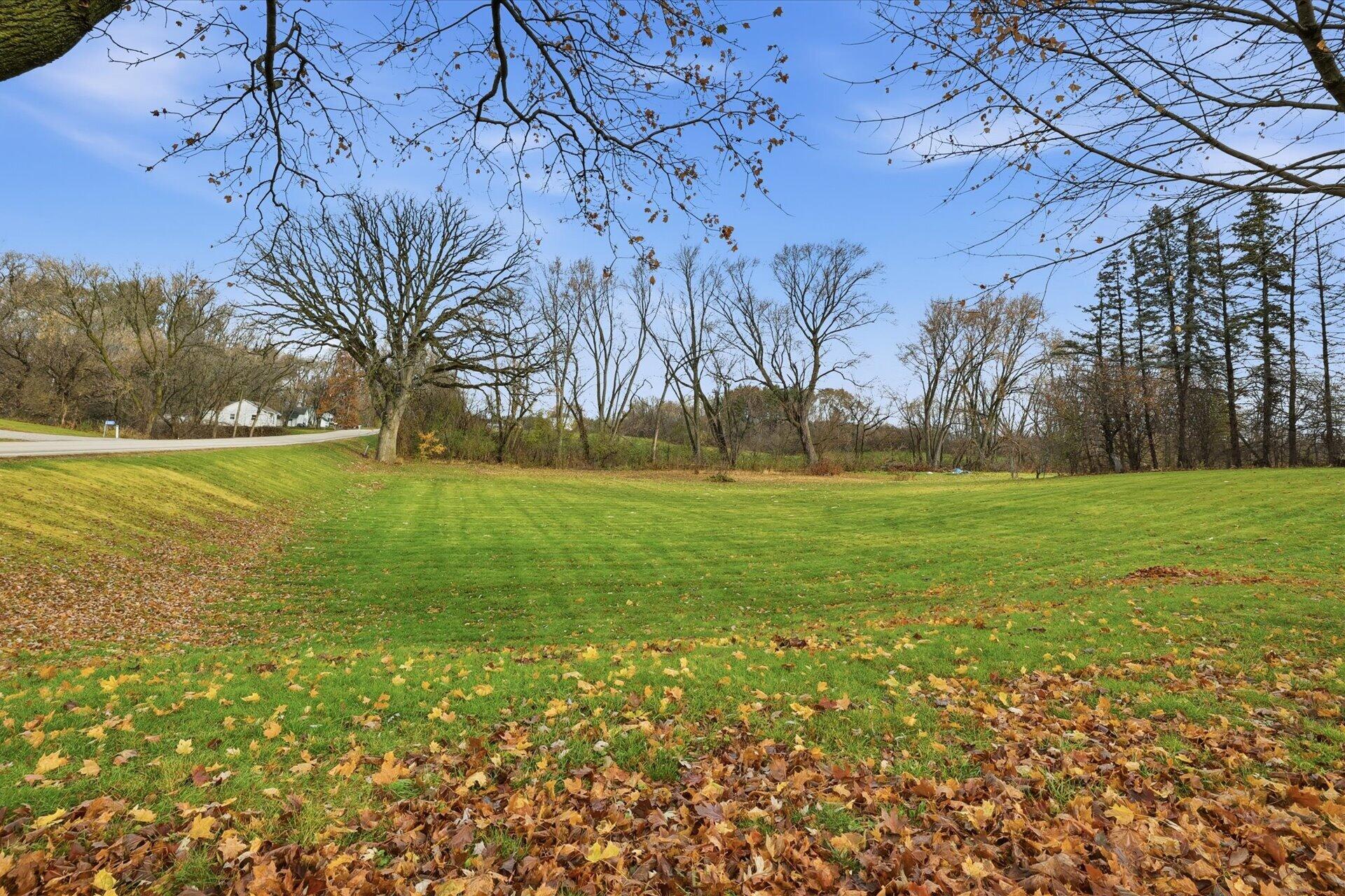 N8838 County Road East East Troy, WI 53120 - Photo 21 of 26 Front Left Side of Home