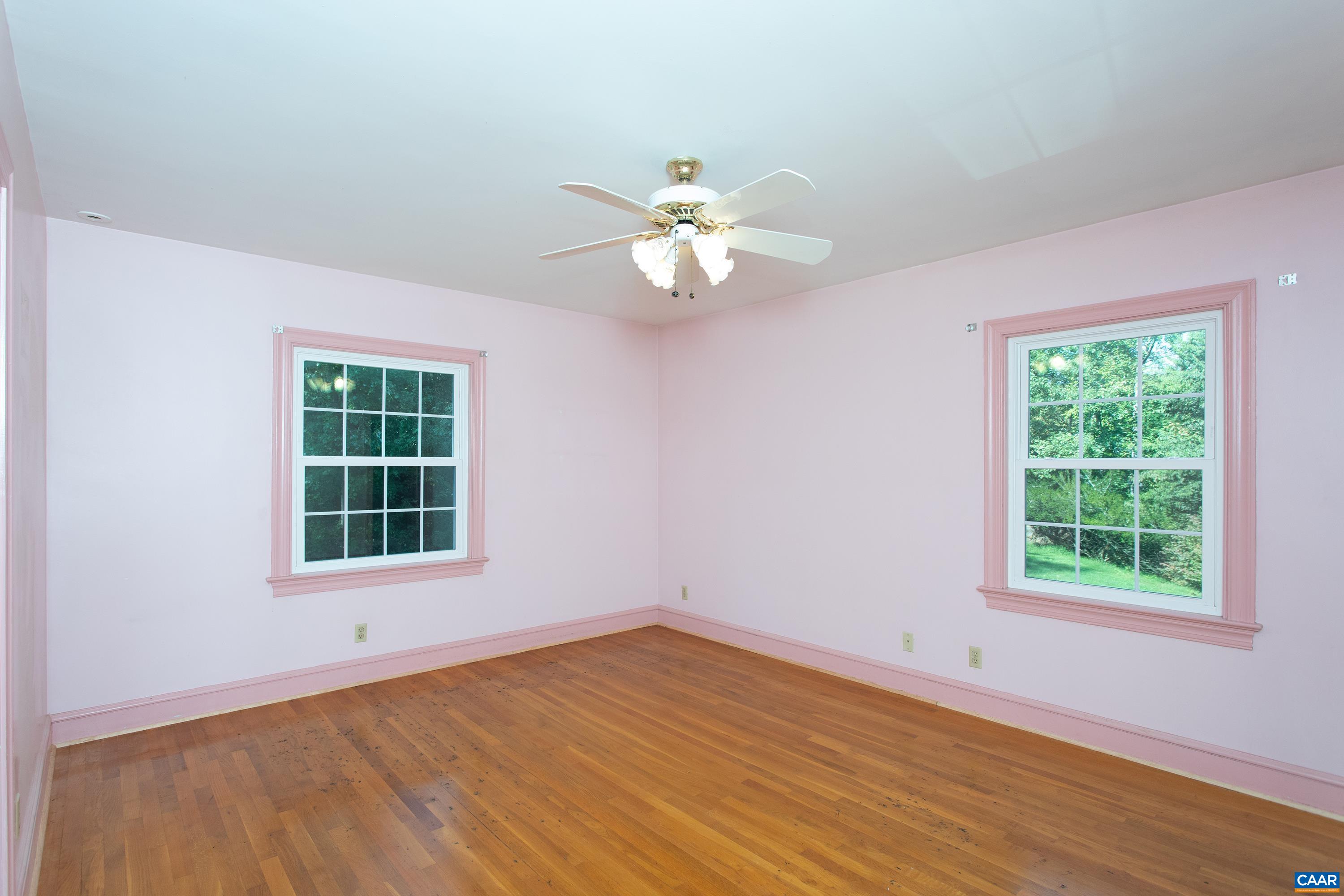 2617 Northfield Road Charlottesville, VA 22901 - Photo 23 of 68 an empty room with a window and a fan