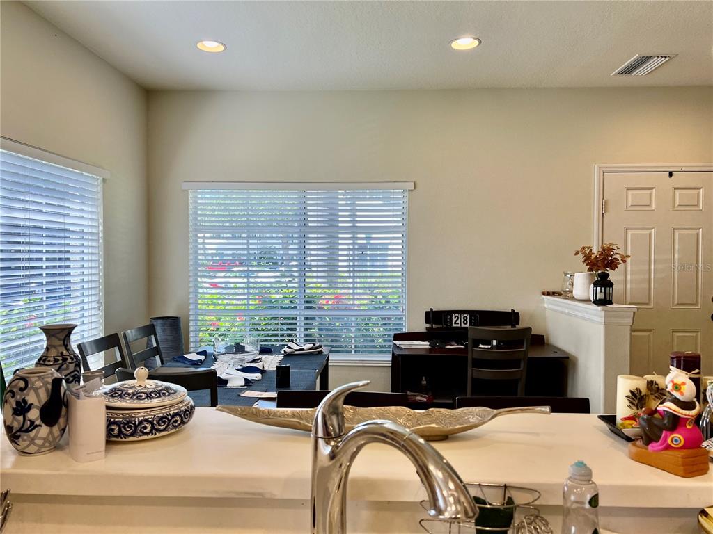 232 Cape Harbour Loop, Unit 101 Bradenton, FL 34212 - Photo 4 of 16 a room with furniture a bed and a window