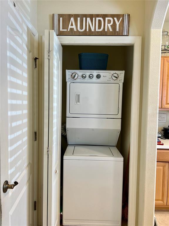 232 Cape Harbour Loop, Unit 101 Bradenton, FL 34212 - Photo 9 of 16 a utility room with dryer and washer