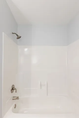 a bathroom with a bathtub