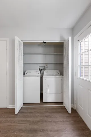 a utility room with washer and dryer