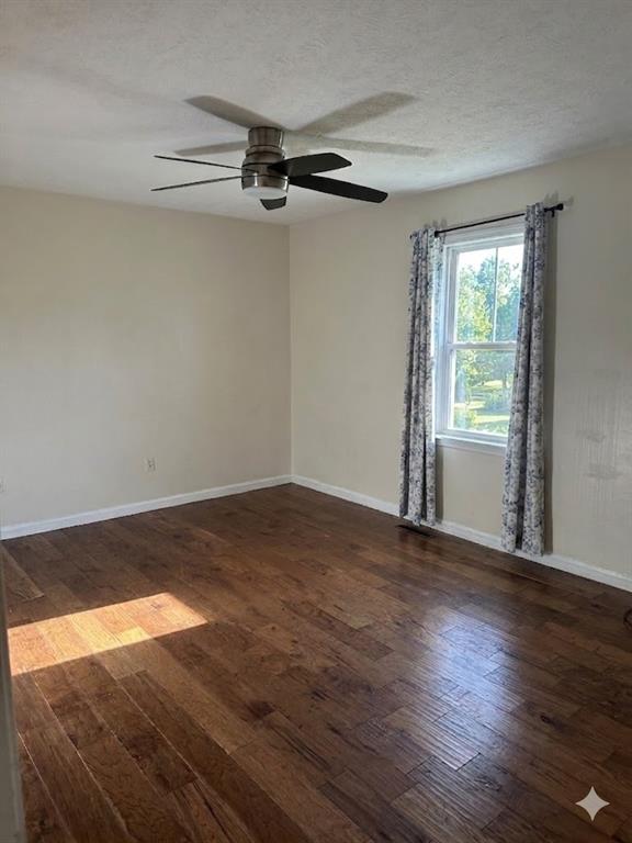 27 Carriage Trace Southeast Cartersville, GA 30121 - Photo 21 of 26 wooden floor in an empty room with a window