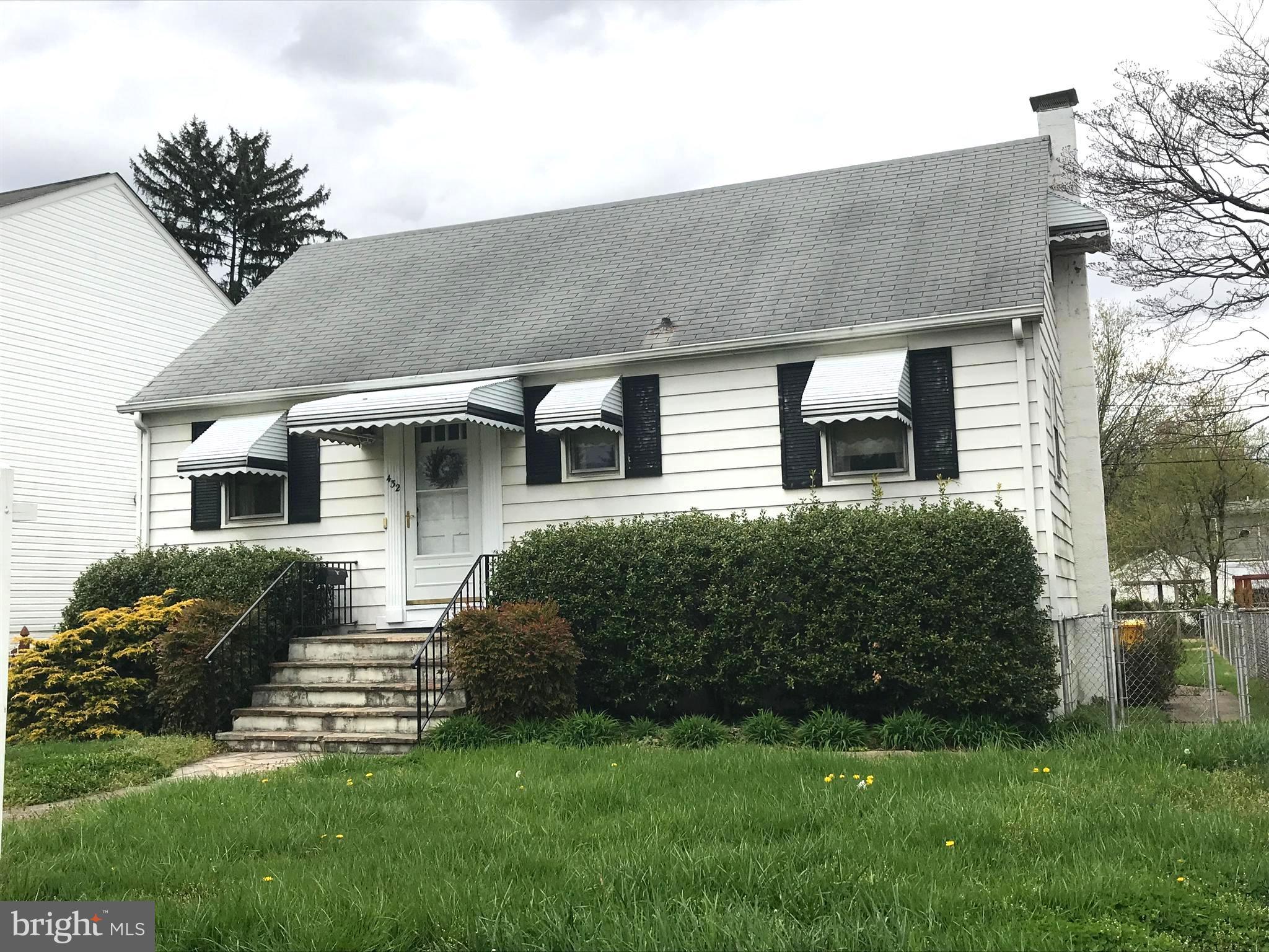 432 Cleveland Road Linthicum Heights, MD 21090 - Photo 1 of 18 a front view of a house with a garden