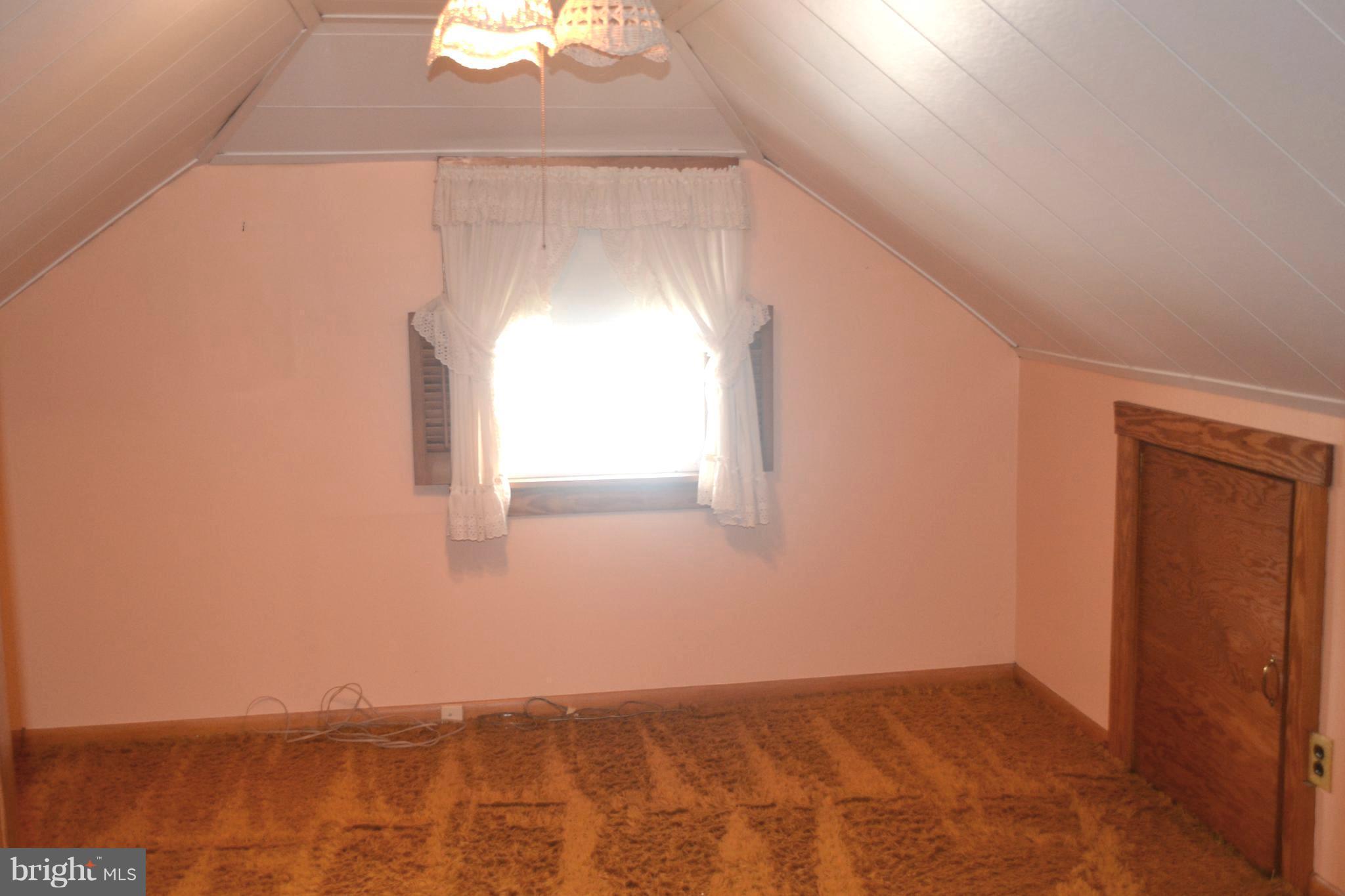 432 Cleveland Road Linthicum Heights, MD 21090 - Photo 15 of 18 a view of an empty room and window