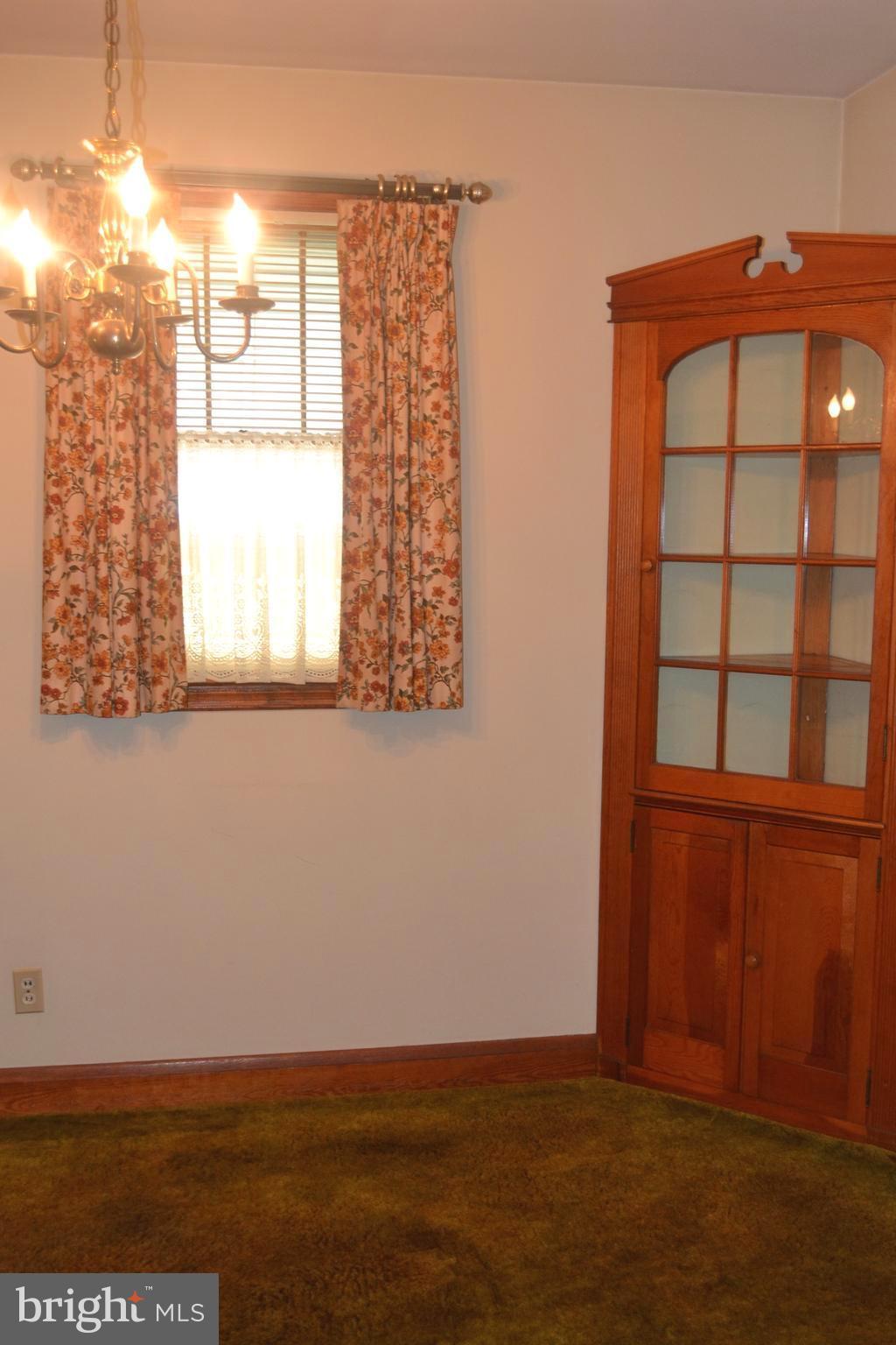 432 Cleveland Road Linthicum Heights, MD 21090 - Photo 6 of 18 view of room with window and hardwood floor