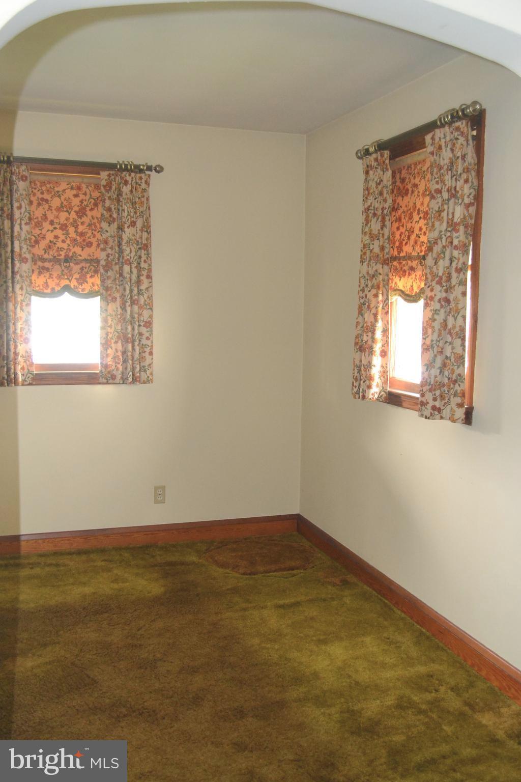 432 Cleveland Road Linthicum Heights, MD 21090 - Photo 7 of 18 an empty room with a window