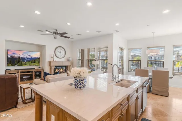a view of a dining room with furniture window and outside view