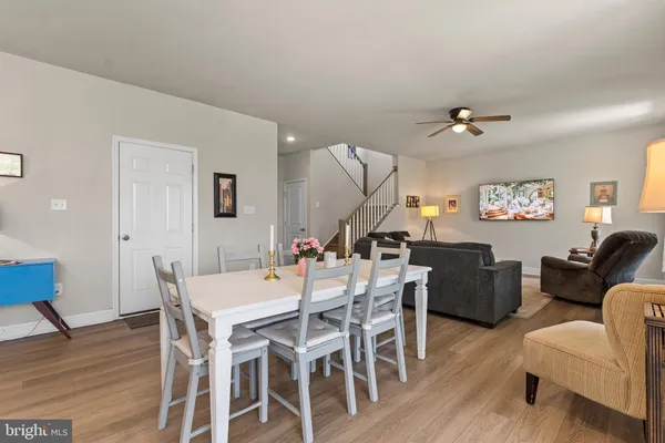 a kitchen with stainless steel appliances a sink and cabinets