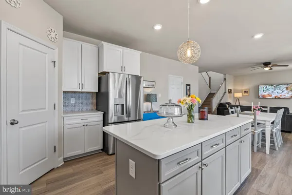 a bedroom with a bed and a table in it