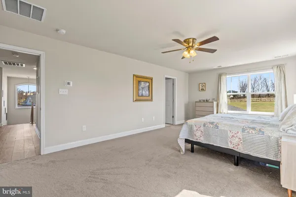 a view of a lake with a yard