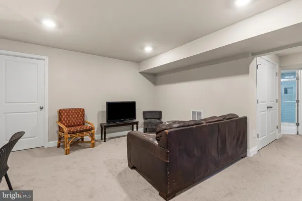 an aerial view of a house with a ocean view